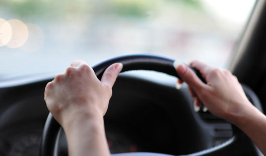 hands on steering wheel